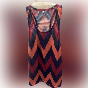 Funky women's summer shirt size is "large" but it ran small. EUC